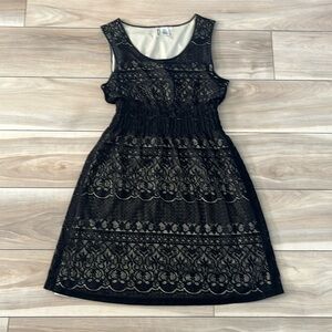Miss Pinky size L black sleeveless lace dress with nude lining.